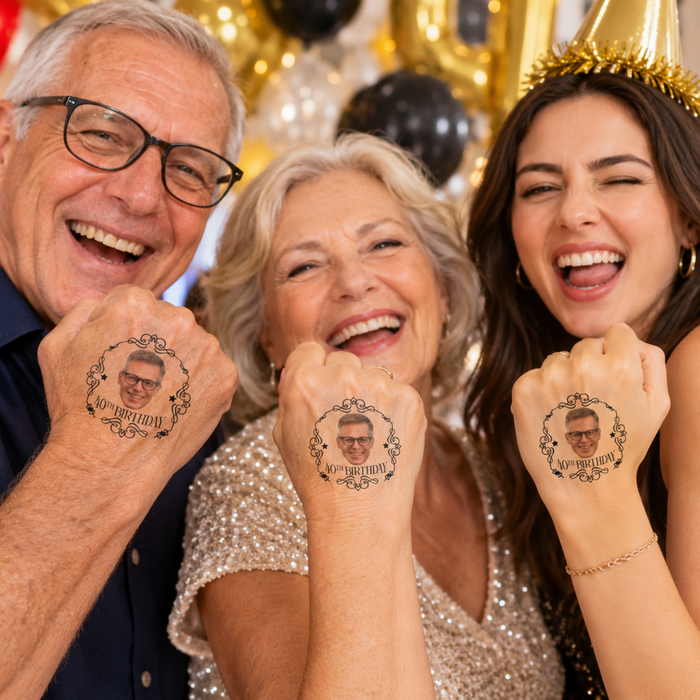 Three guests showing personalized 40th birthday face tattoos with photo on their hands at a gold and black party