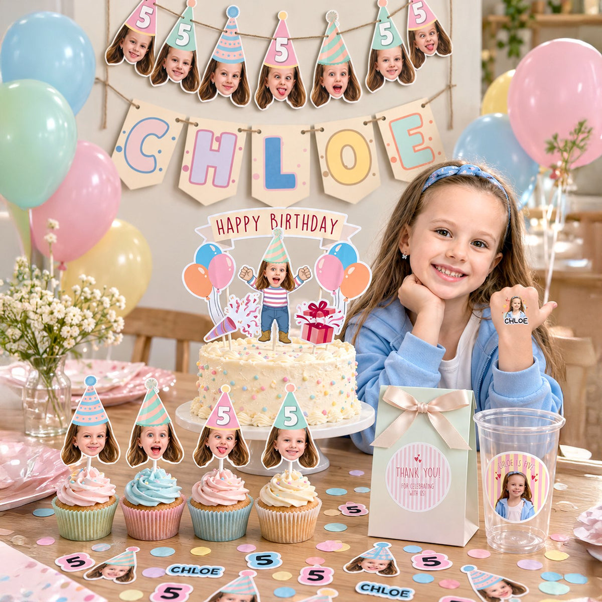 Face Party Box: personalized party set with face bunting, name pennant, cake topper, cupcake toppers, favor bag, cup and confetti on a party table
