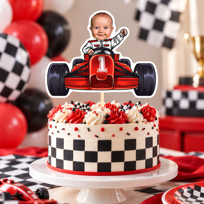 Personalized race car cake topper with a baby's face and number 1 on a red and white checkered racing birthday cake with red and black balloons